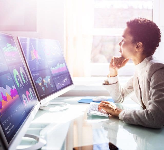 Woman looking at data on her computer